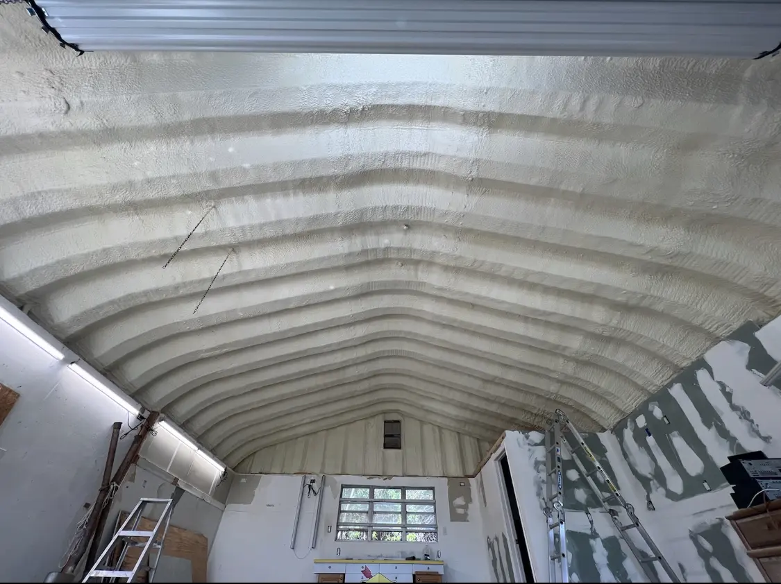 Spray polyurethane foam applied to the underside of a metal roof deck in Lithia Springs