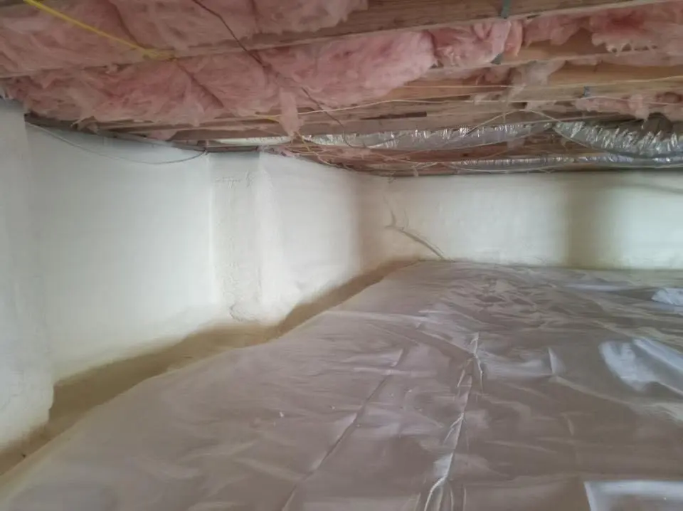 Crawl space encapsulation with closed-cell spray foam for Commercial Roof Restoration in Lithia Springs